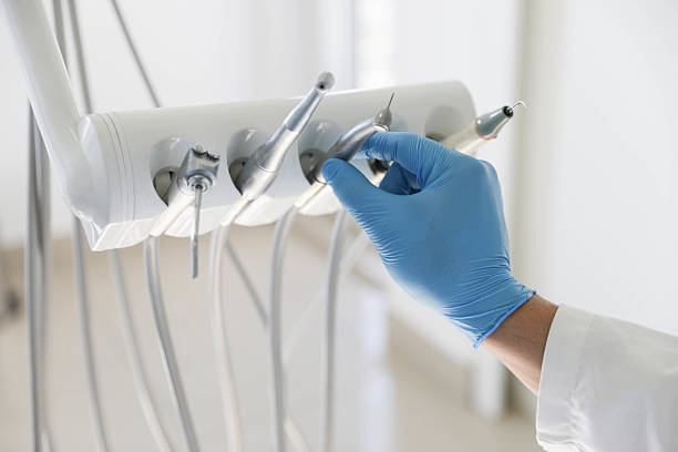 Professional Emergency Dentist technician working in Sand Springs, OK